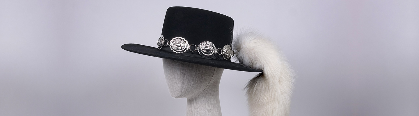 Stevie Ray Vaughan hat with faux animal tail | Bullock Texas State 