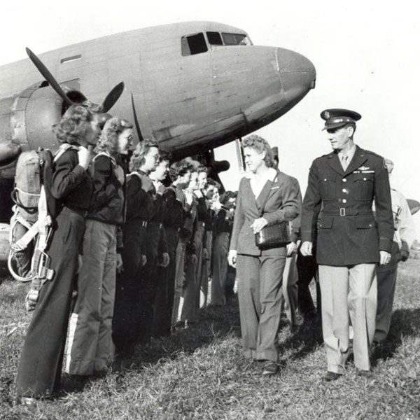 Lt. Col. Jacqueline Cochran greets Women Air Service Pilots. Jackie Cochran had a commercial pilot’s license and competed in flying competitions worldwide. She recruited a group of 25 experienced female pilots to work as ferry pilots for the Royal Air Force. Courtesy National Archives, Washington, DC