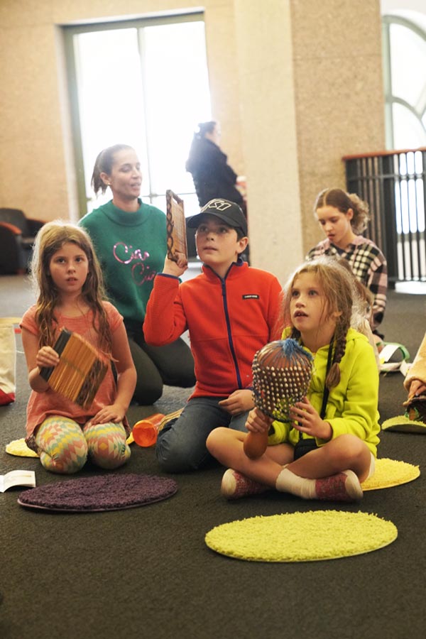 children listening to a storyteller at the Bullock Museum