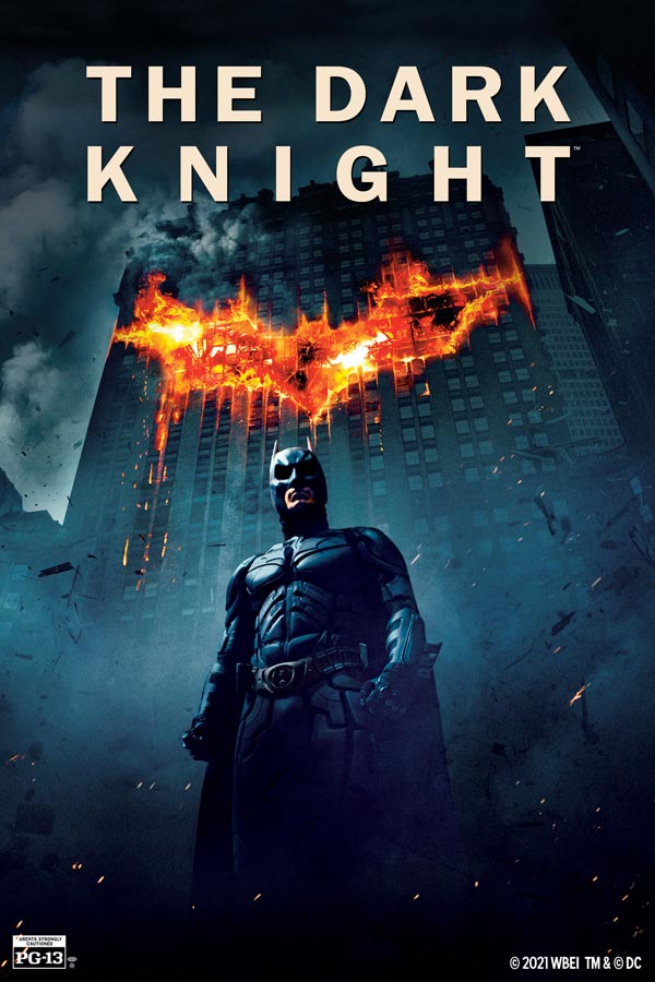 a movie poster for "The Dark Knight" with Batman standing in front of a building with a Bat-signal in flames on the side of a building