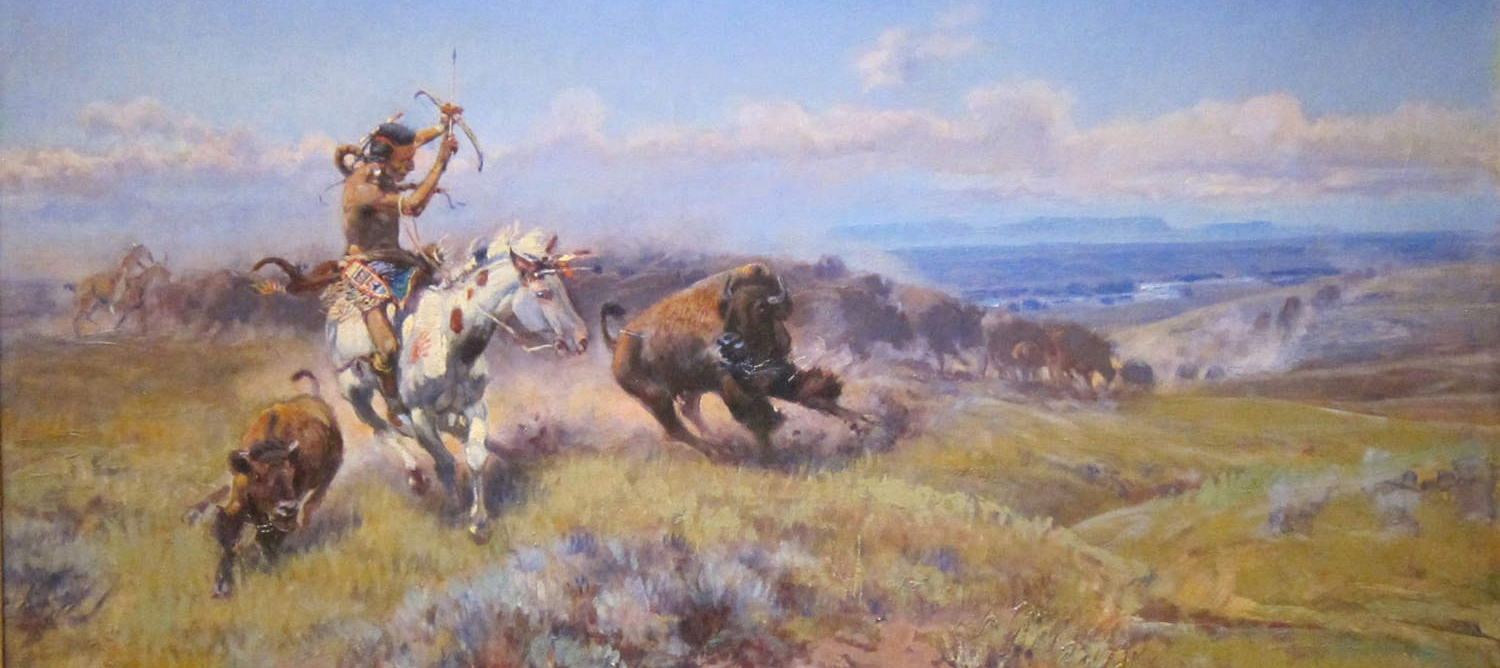 Charles Russell painting of Native American on horsback hunting buffalo