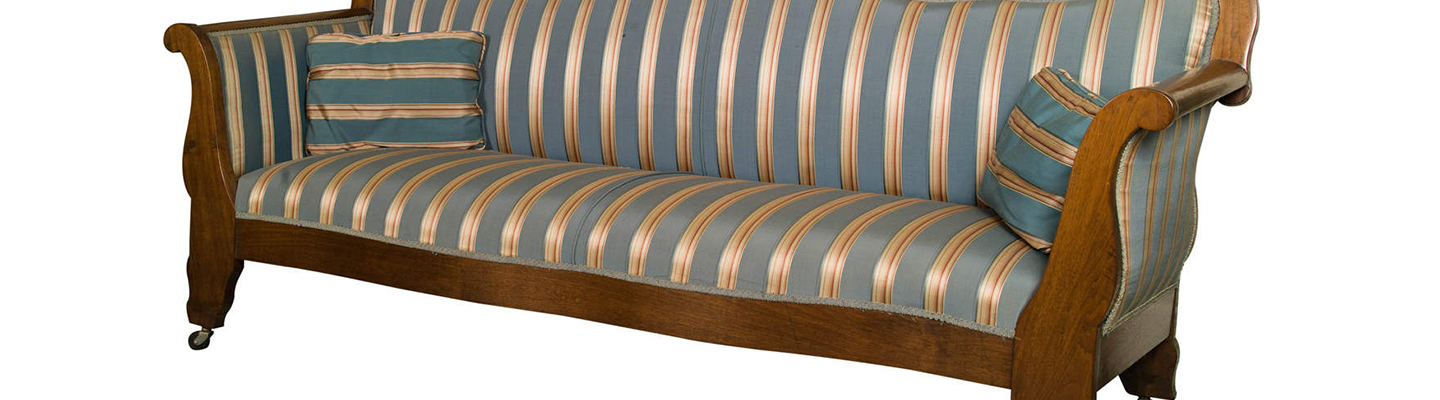 Empire-style couch with blue and gold upholstery