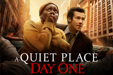 film poster for "A Quiet Place: Day One" with two characters looking up at the sky in horror